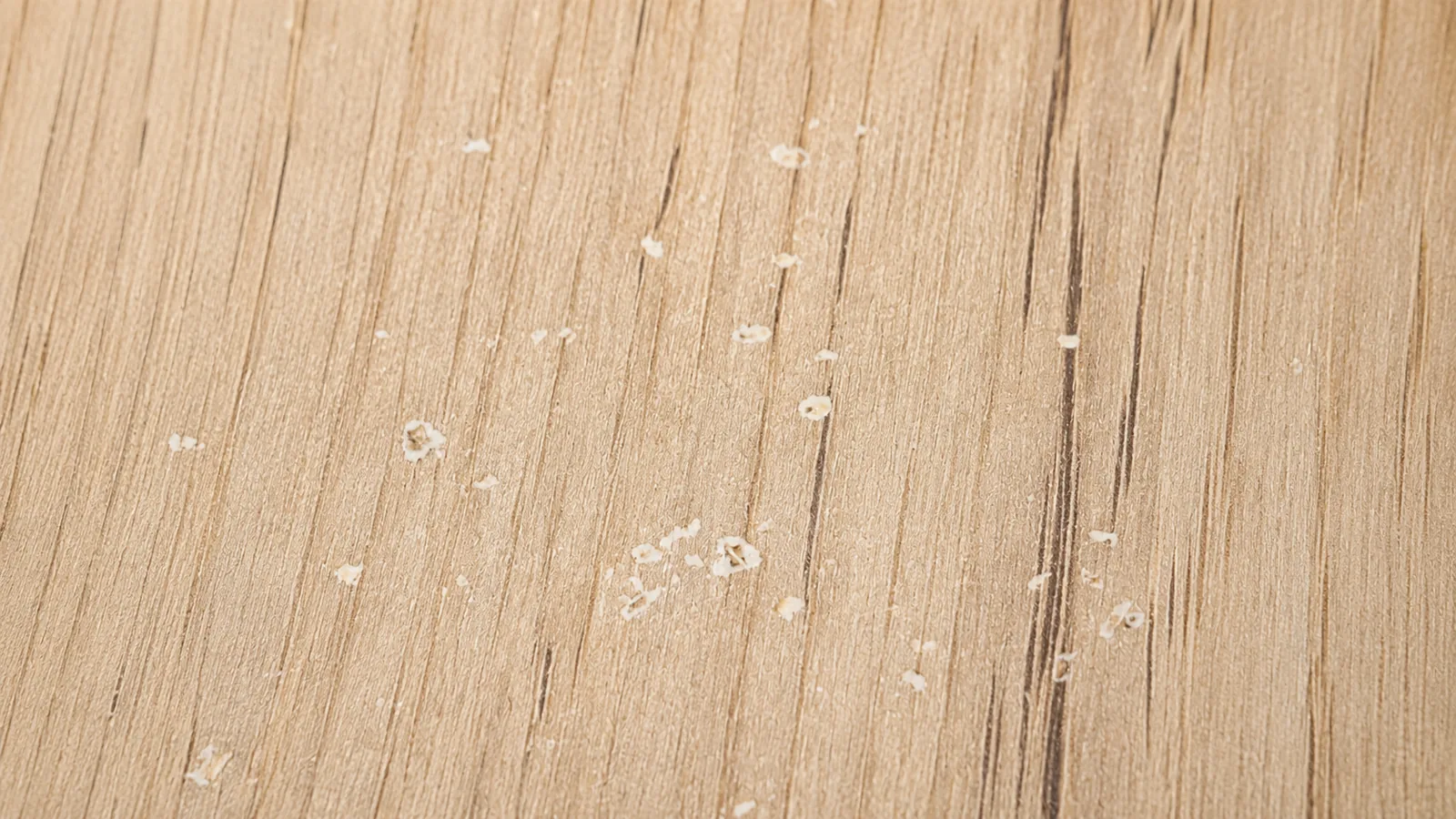 Melamine board surface bubbles and white marks close-up