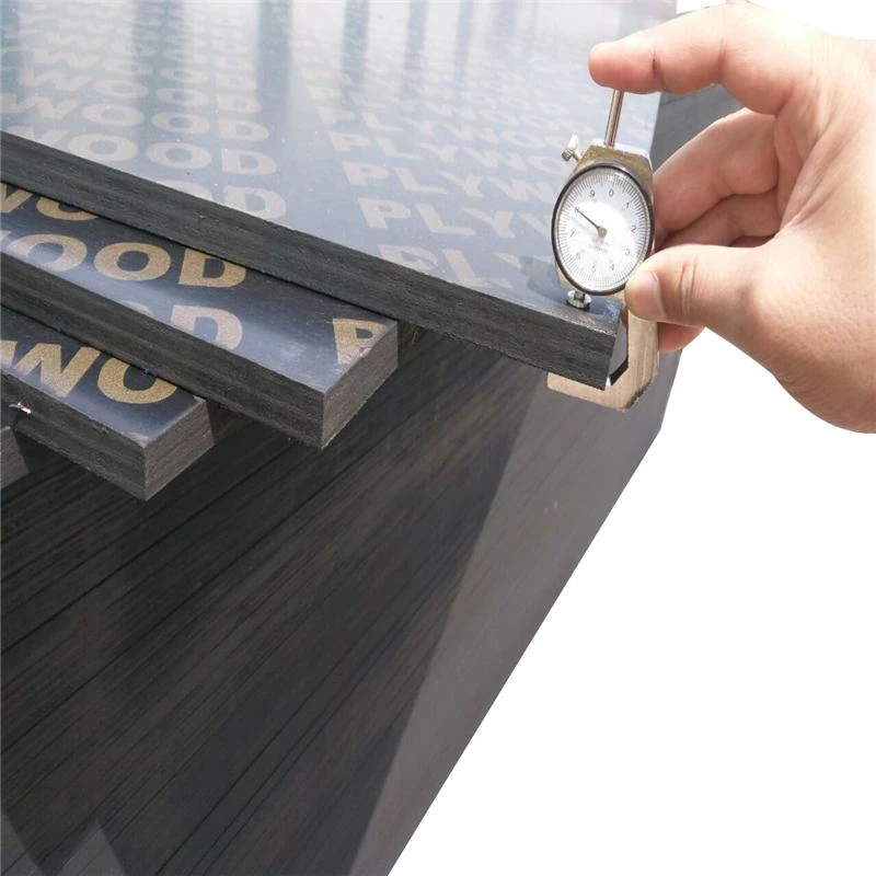 Measuring film-faced plywood with a dial thickness gauge